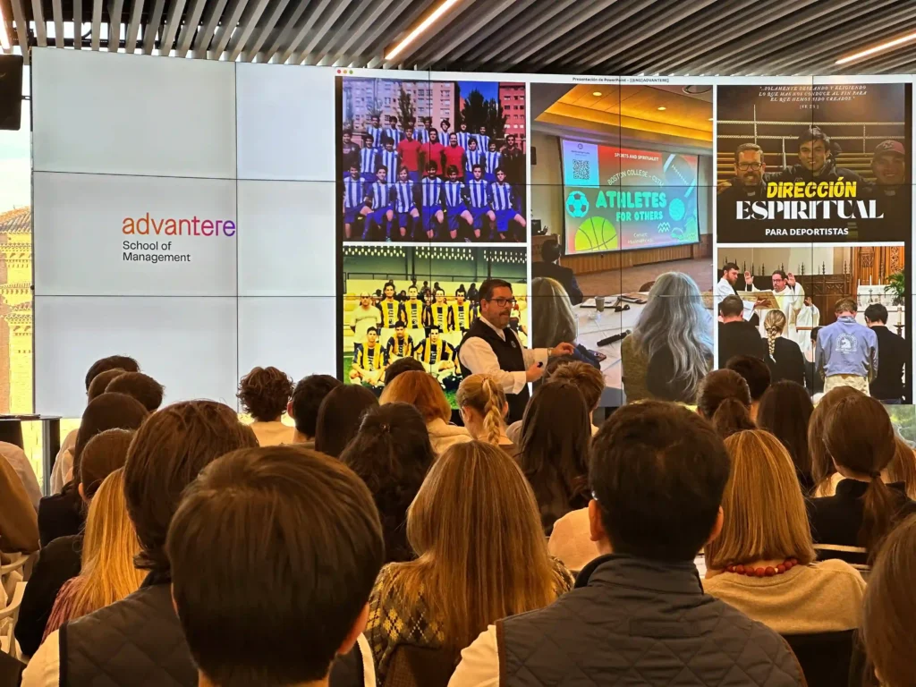 Students reflecting on leadership insights during the ‘Leadership Through Sports’ lecture.