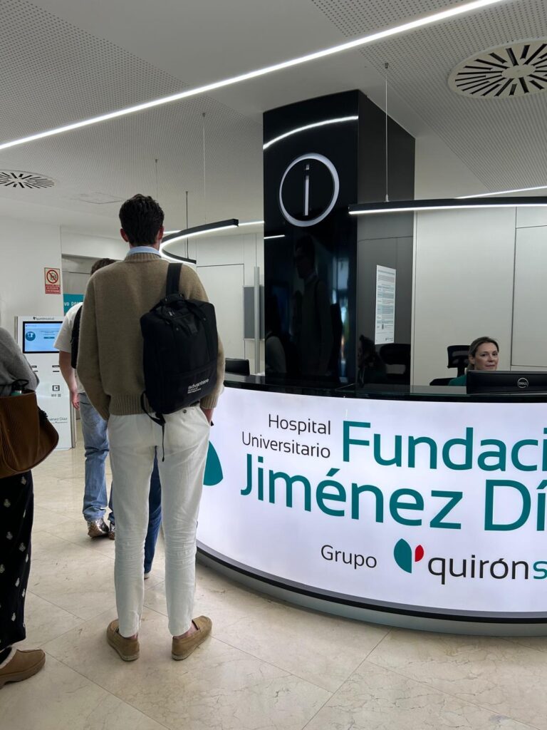 Students observing hospital signage and patient routes during a human-centered design sprint in Madrid